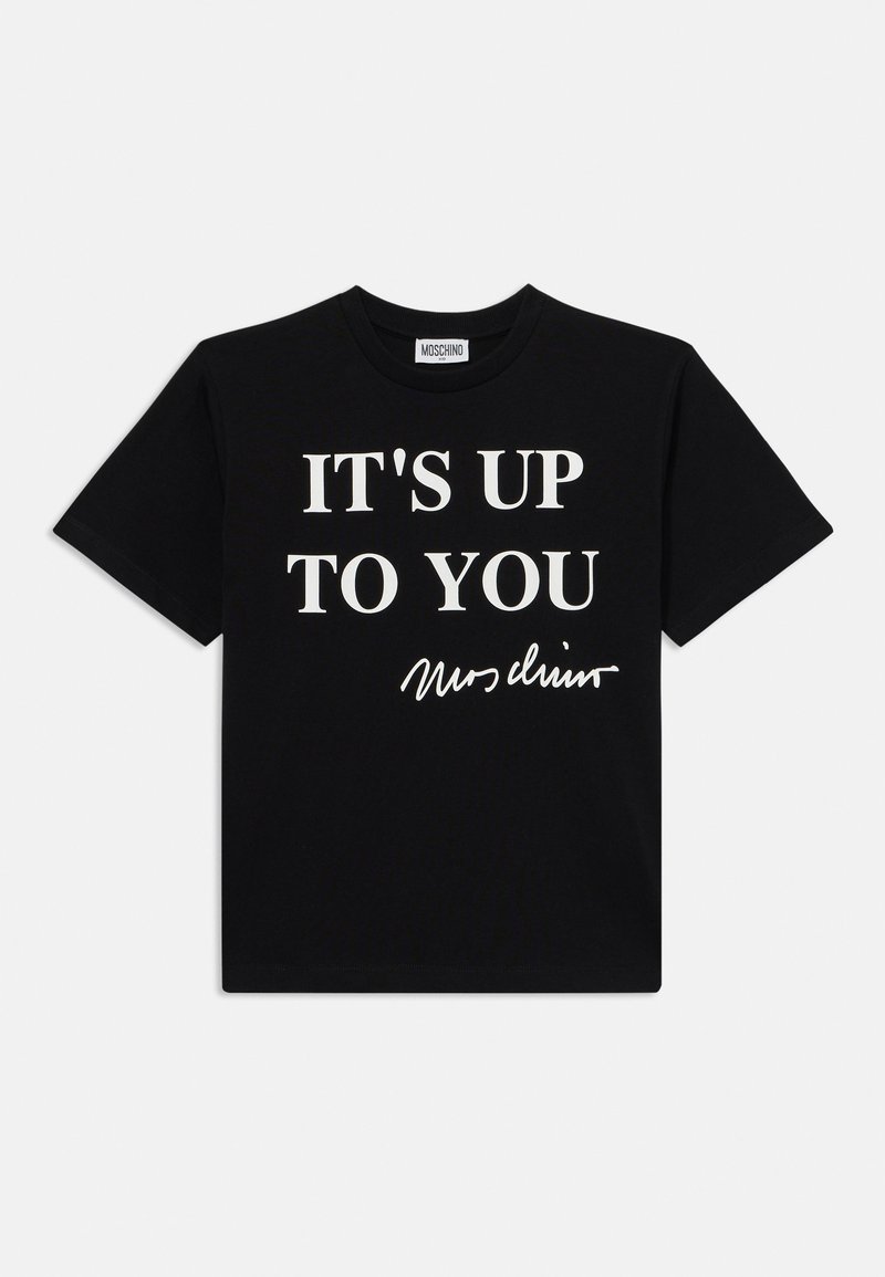 Svart bomull t-shirt med vit text som säger "DET ÄR UPP TILL DIG" med en signatur nedanför. Rundad krage, korta ärmar, enkel design.