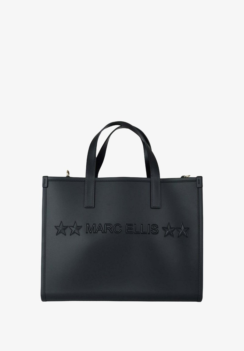 Sac fourre-tout noir en cuir lisse, avec le texte embossé "MARC ELLIS" et des motifs d'étoiles. Conçu avec deux poignées supérieures et une fermeture éclair.