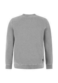 Grijze sweatshirt met lange mouwen, ronde hals, zachte textuur en geribbelde zoom. Heeft een klein logo-label aan de zijkant.