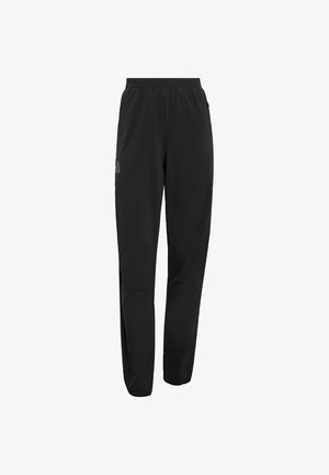 Mustad sportpüksid, mis on valmistatud kergest kangast, varustatud elastse vöökohaga, küljetaskute ja peene logoseljaga esiküljel.