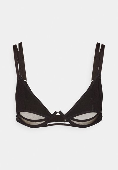 Melna trijstūra formas bralette ar plānām siksniņām, caurspīdīgu acu paneļa un izgriezumu centrā. Mīksta auduma, ar minimālu šuvju skaitu.