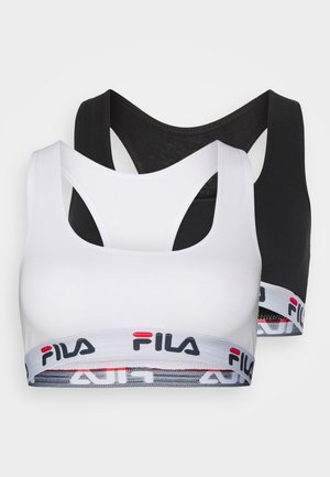 Dos sujetadores deportivos en negro y blanco, con una suave mezcla de algodón, diseño de espalda nadadora y una banda elástica impresa con el logo en la parte inferior.