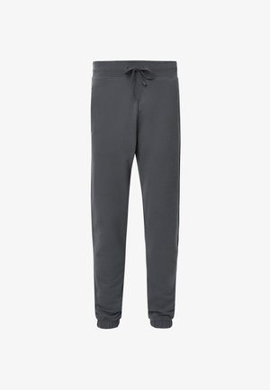 Pantalones de chándal grises hechos de tela suave, con cintura elástica y cordón, bolsillos laterales y puños en los tobillos acanalados.