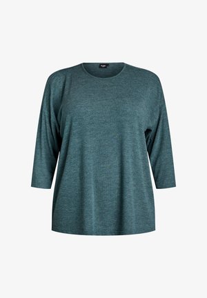 Türkises Langarmshirt mit Rundhalsausschnitt, aus weichem, strukturiertem Stoff. Verfügt über einen lockeren Schnitt und Fallschultern. Minimalistisches Design.