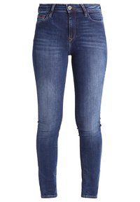 Mörkblå smala jeans gjorda av denim. Har hög midja, fem fickor och en blixtlås med metallknapp. Blekta områden finns.