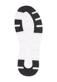 Bílá podrážka tenisky s černou gumovou vrstvou, jež má texturovaný vzor, drážky pro trakci a velké segmentované designové prvky.