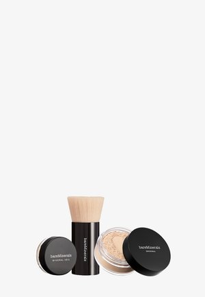 BareMinerals mineral makeup set includes two black jars and a brush. The jars contain loose powder, and the brush has a light-colored, soft bristle head.