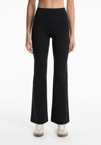 OYSHO NEOPRENE-EFFECT RISE FLARE  - Hlače - black
