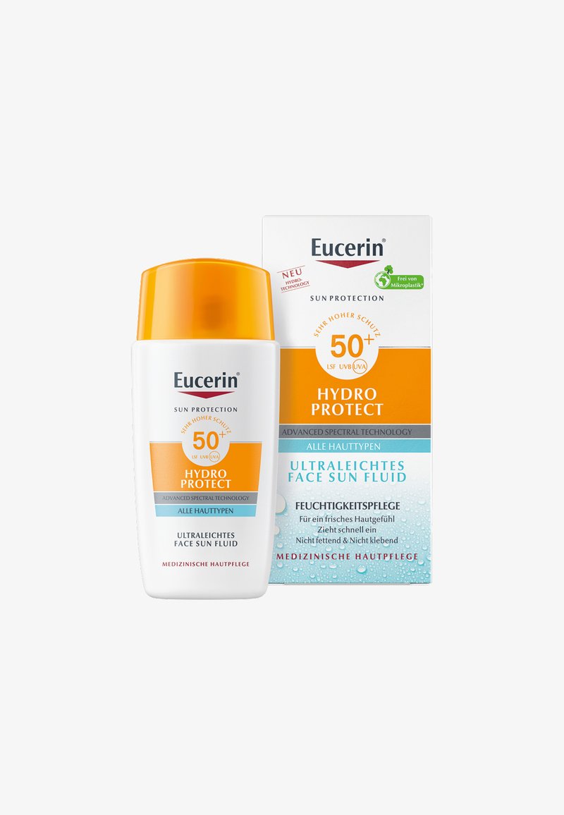 Eucerin Hydro Protect 50+ Gesichtssonnenfluid in einer weißen Flasche mit orangefarbenem Deckel; enthält eine blau-orangefarbene Verpackung mit Textdetails.
