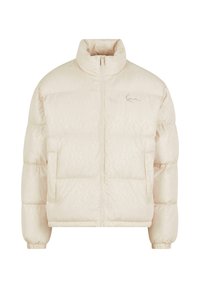 Pufota bomber jaka gaisā bēšā krāsā ar augstu apkakli, priekšu ar rāvējslēdzēju, divām sānu kabatām un smalku reljefa rakstu uz auduma. Paraksta elements uz krūtīm.