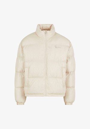 Pūkuota bomber tipo striukė šviesiai bežėje spalvoje su aukštu apykakle, užtrauktuku priekyje, dviem šoninėmis kišenėmis ir subtiliu reljefu ant audinio. Pasirašytas elementas ant krūtinės.