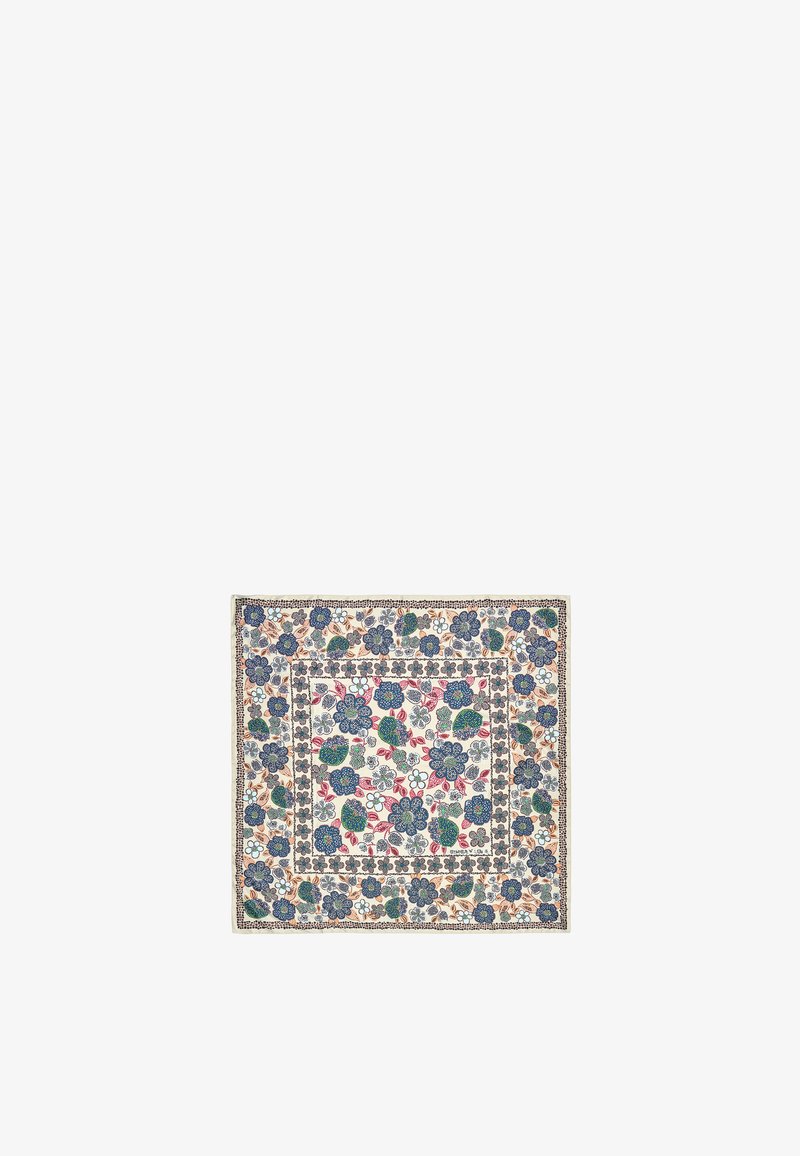 Vierkante katoenen tapijt met een bloemmotief in blauwe, groene en rode tinten op een witte achtergrond, omrand met een gestructureerde rand.