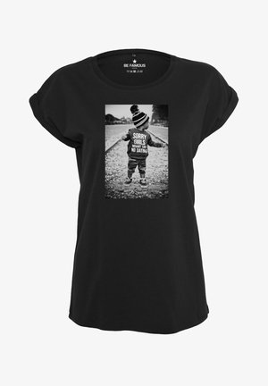 Black t-shirt with rolled sleeves featuring a central monochrome graphic of a child in a striped hat, text "SORRY GIRLS MOMMY SAY NO DATING."