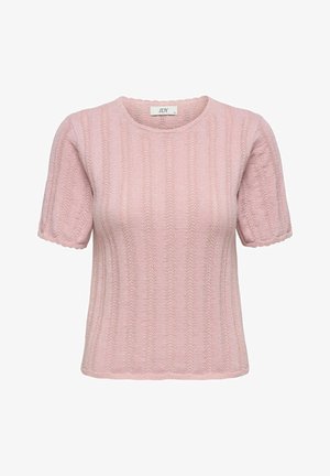 Heled roosa kudumine lühikesed varrukad, ribiline tekstuur, ümmargune kaelus ja lainelised servad, millel on kaubamärgi silt kaela kohal.