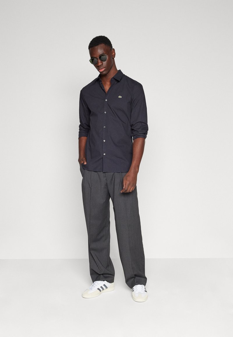 how to prepare for wedding dress fitting LACOSTE Men's Slim Fit Heathered Tracksuit Pants (Grey Chine)
