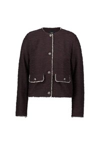 Veste cropée de couleur violet foncé en tissu texturé, avec quatre boutons argentés, deux poches avant et un liseré blanc le long des bords.