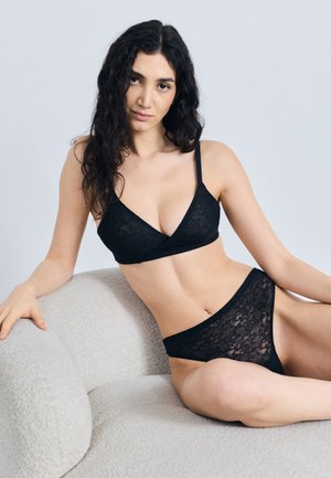 SPANXSUPERSMOOTH™ DAY TO DATE NIGHT THONG - String - very black