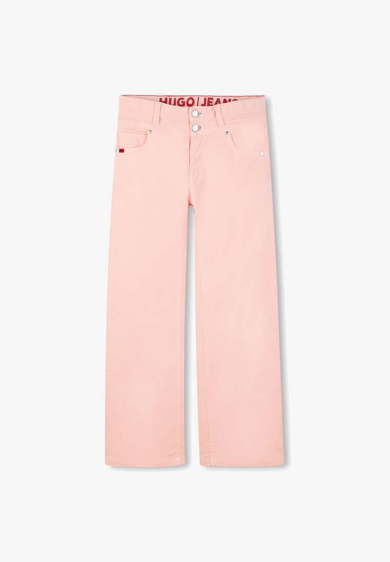 Jean rose pâle à jambes droites avec double boutons argentés, poches avant, passants de ceinture, et marquage "HUGO JEANS" à l'intérieur de la ceinture.