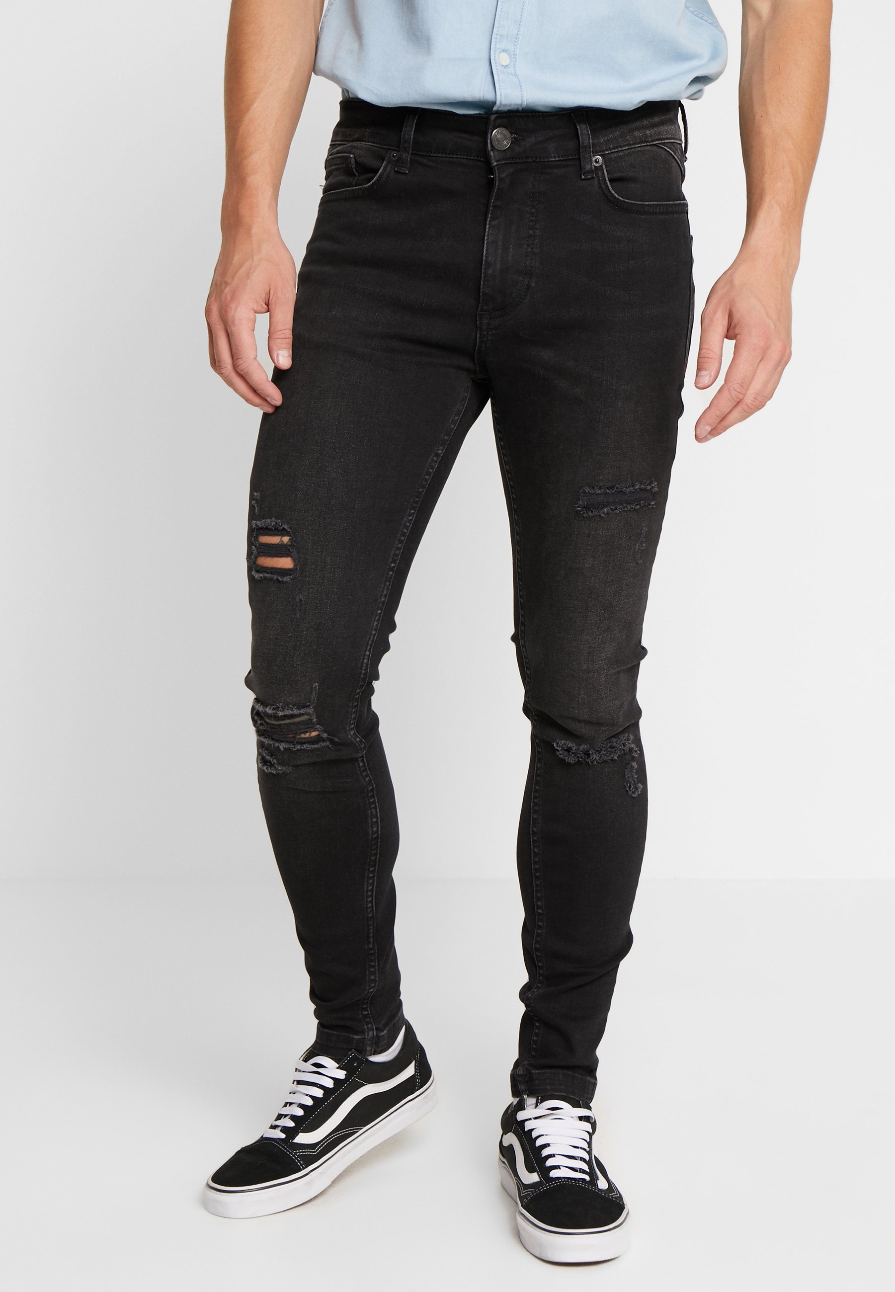 11 degrees black ripped jeans