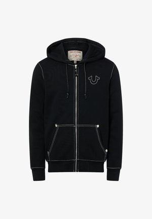 Schwarzer Kapuzenpullover mit Reißverschluss, weißen Kontrastnähten, Fronttaschen, einer Kapuze mit Kordelzug und einem kleinen True Religion Hufeisen-Logo auf der Brust.