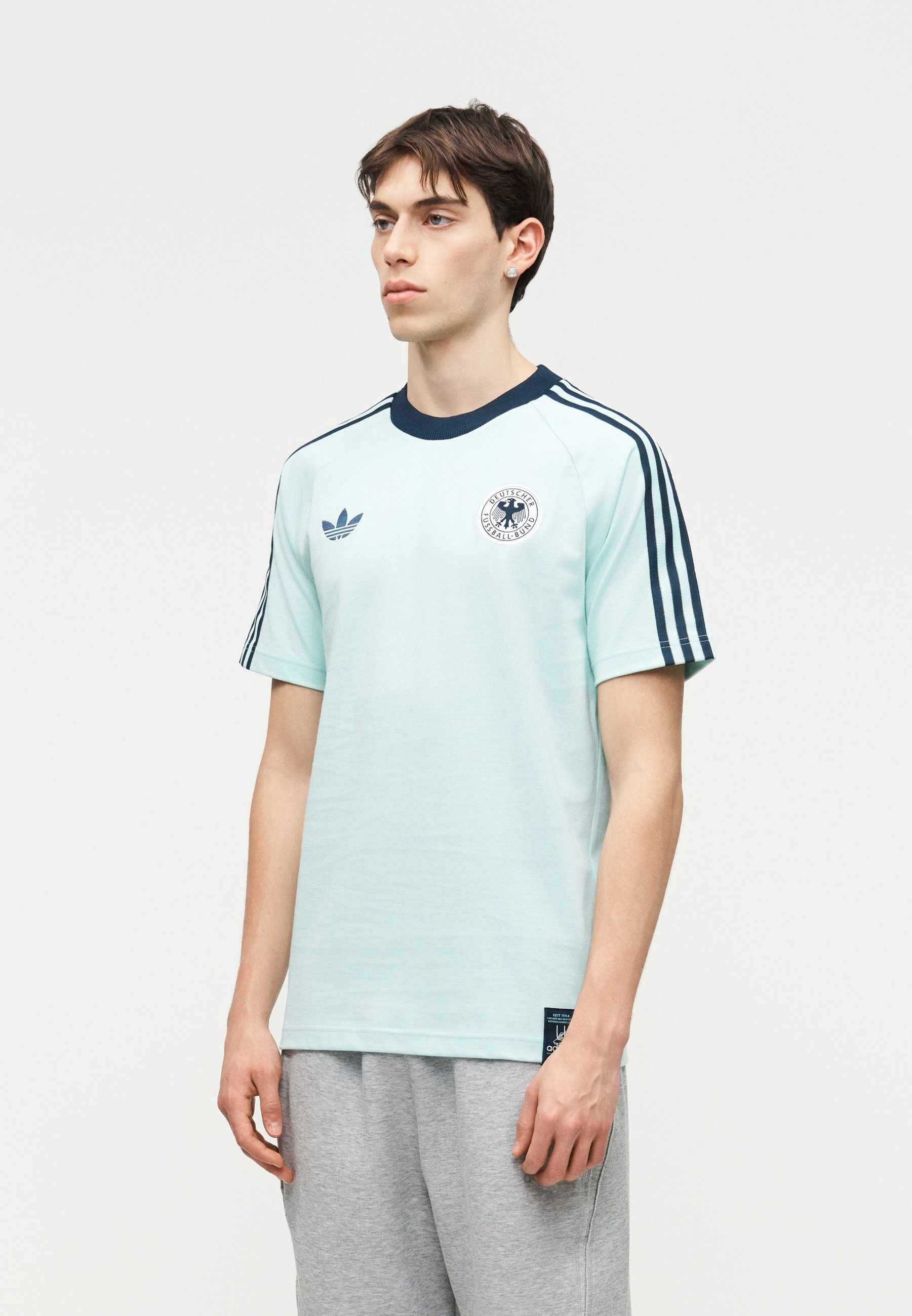 adidas Originals GERMANY ORIGINALS - Sports T-shirt - semi flash