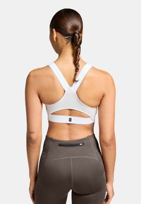 On PERFORMANCE FLEX  - Urheiluliivit: keskitason tuki - undyed white