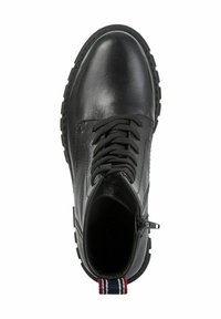 Black leather ankle boot with round toe, textured surface, and lacing system; features side zip and striped pull tab at the heel.