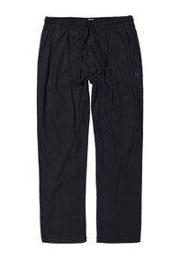 Black, loose-fitting pants with an elastic waistband, drawstring, and side pockets. Soft fabric with minimal design and subtle branding detail.