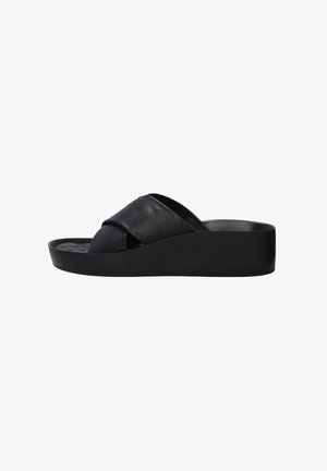 Black platform sandals with a cross strap design, made of textured leather, featuring a wide sole and smooth finish.