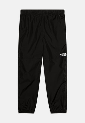 Črne windbreaker hlače z elastiko v pasu, zoženimi nogami in z zadrgami na manšetah. Imajo bel logo na zgornjem delu hlač. Lahki material.