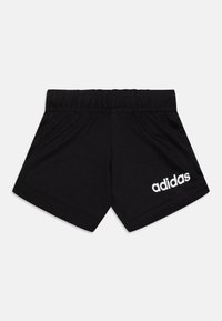 Crne atletske hlače od mekog materijala, s elastičnom gumom u struku i bijelim Adidas logotipom na donjoj lijevoj prednjoj strani.