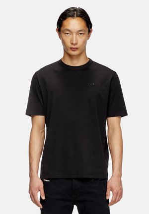 ADJUST SLITS - Basic T-shirt - black