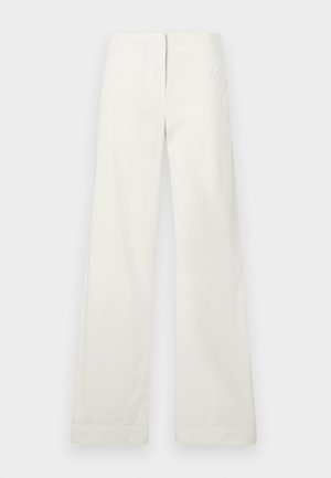 Pantalons larges blancs en coton, avec une coupe droite, une texture lisse et une taille simple sans fermetures visibles.