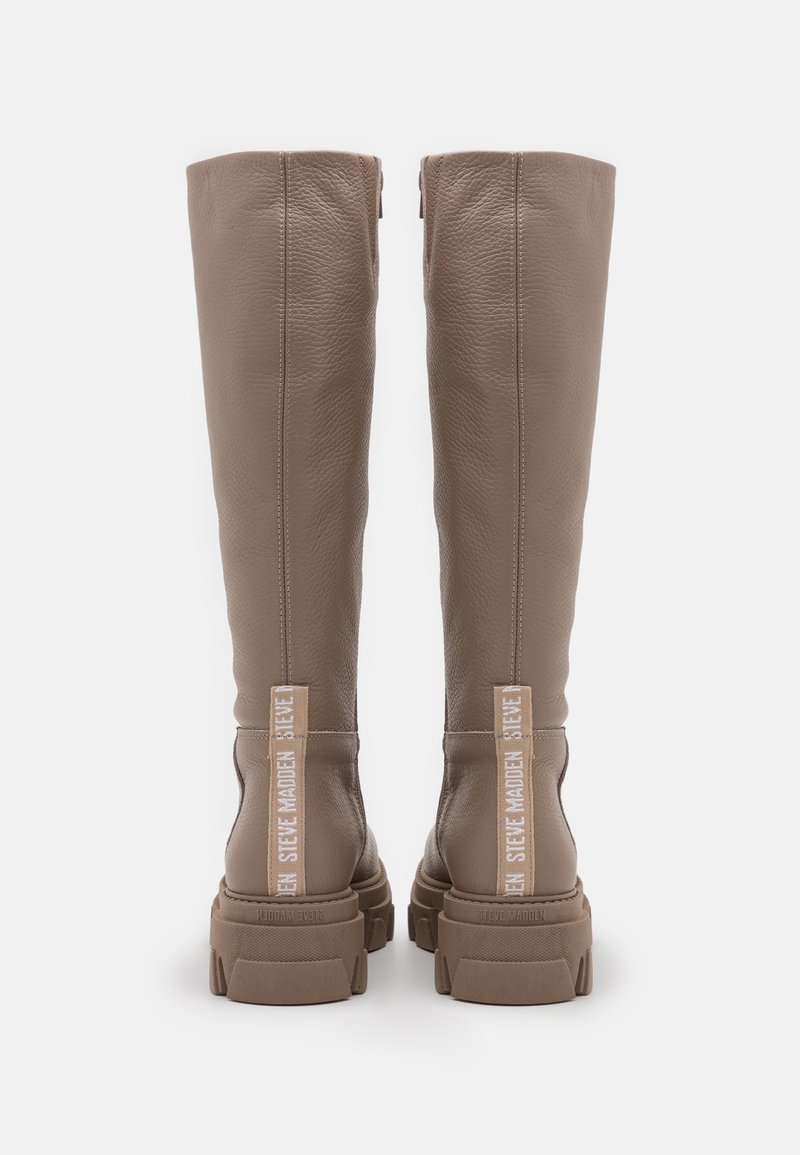 Steve Madden Plateaustiefel beige (Pre-owned) Zalando