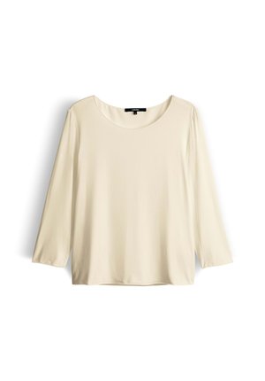 Langärmlige, cremfarbene Bluse aus weichem, glattem Stoff mit weitem Rundhalsausschnitt. Bietet eine lockere Passform und einen leicht abgerundeten Saum für zusätzlichen Komfort.