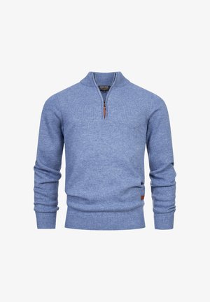 Pullover in azzurro chiaro realizzato in tessuto a maglia, con colletto a mezza zip, polsini a coste e una piccola etichetta in pelle sul bordo.