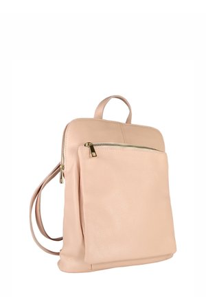 Light pink leather backpack with a front zippered pocket, gold-colored zipper pulls, adjustable straps, and a top handle on a white background.
