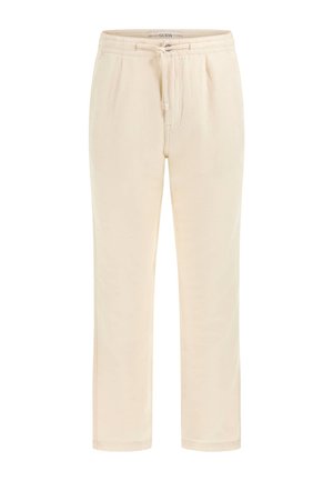 Beige sweatpants made of soft fabric with an elastic waistband, drawstring, and side pockets. Straight-leg design with a smooth texture.