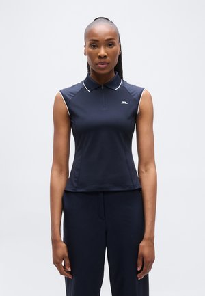 Tmavomodré bezrukávové polo s golierom na zips a bielym lemovaním, s malým logom. Hladká látka a mierne rozšírený strih na spodnom leme.