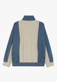 Unauthorized Overgangsjakke - blue