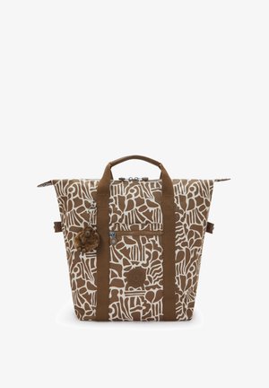 Borsa a tracolla marrone e bianca con due manici, tasca frontale con zip e un piccolo portachiavi a forma di scimmietta di peluche marrone attaccato.