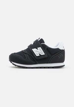 IZ373KN2 UNISEX - Trainers - black