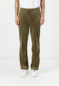 Olivgrüne, samtige Trainingshose mit elastischem Bund, Kordelzug, Seitentaschen und kontrastierenden Nahtdetails.