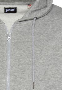 Grauer Reißverschluss-Hoodie mit zwei vorderen Taschen, Kapuze mit Kordelzug und silbernem Reißverschluss. Hergestellt aus weichem Strickstoff mit einer subtilen Textur.