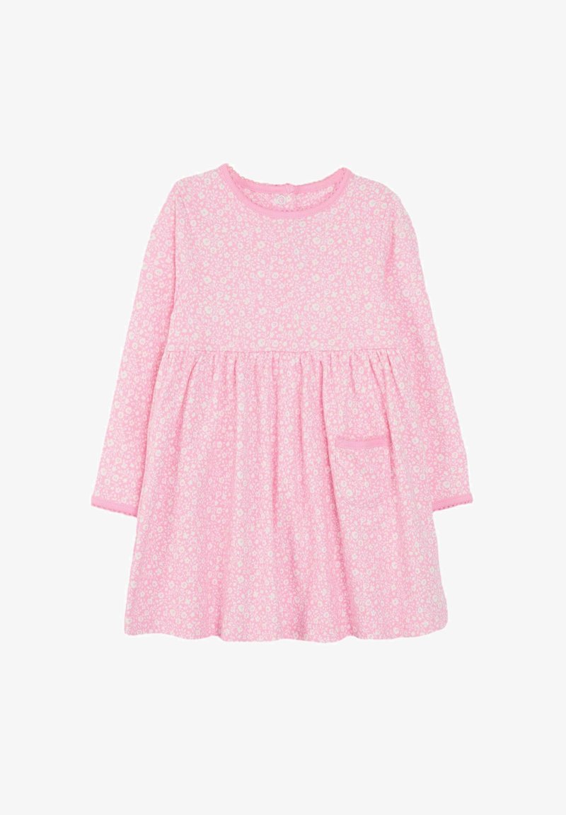 Růžové šaty s dlouhým rukávem a bílým květinovým potiskem, s nařaseným pasem a malými kapsičkami. Vyrobeno z měkké bavlněné tkaniny.