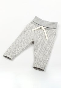 Pantalons pour bébé gris avec des motifs géométriques triangulaires blancs, taille élastique et cordon blanc sur un fond blanc uni.