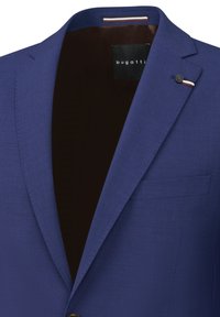 Navy blue blazer with a smooth texture, featuring a notched collar, single button closure, and a left chest pocket; branded tag visible.