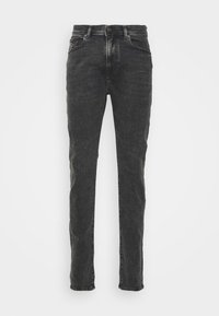 Jeans de mezclilla oscura con un ajuste slim, que cuentan con un cierre de botón, bolsillos estándar y una sutil textura desgastada.
