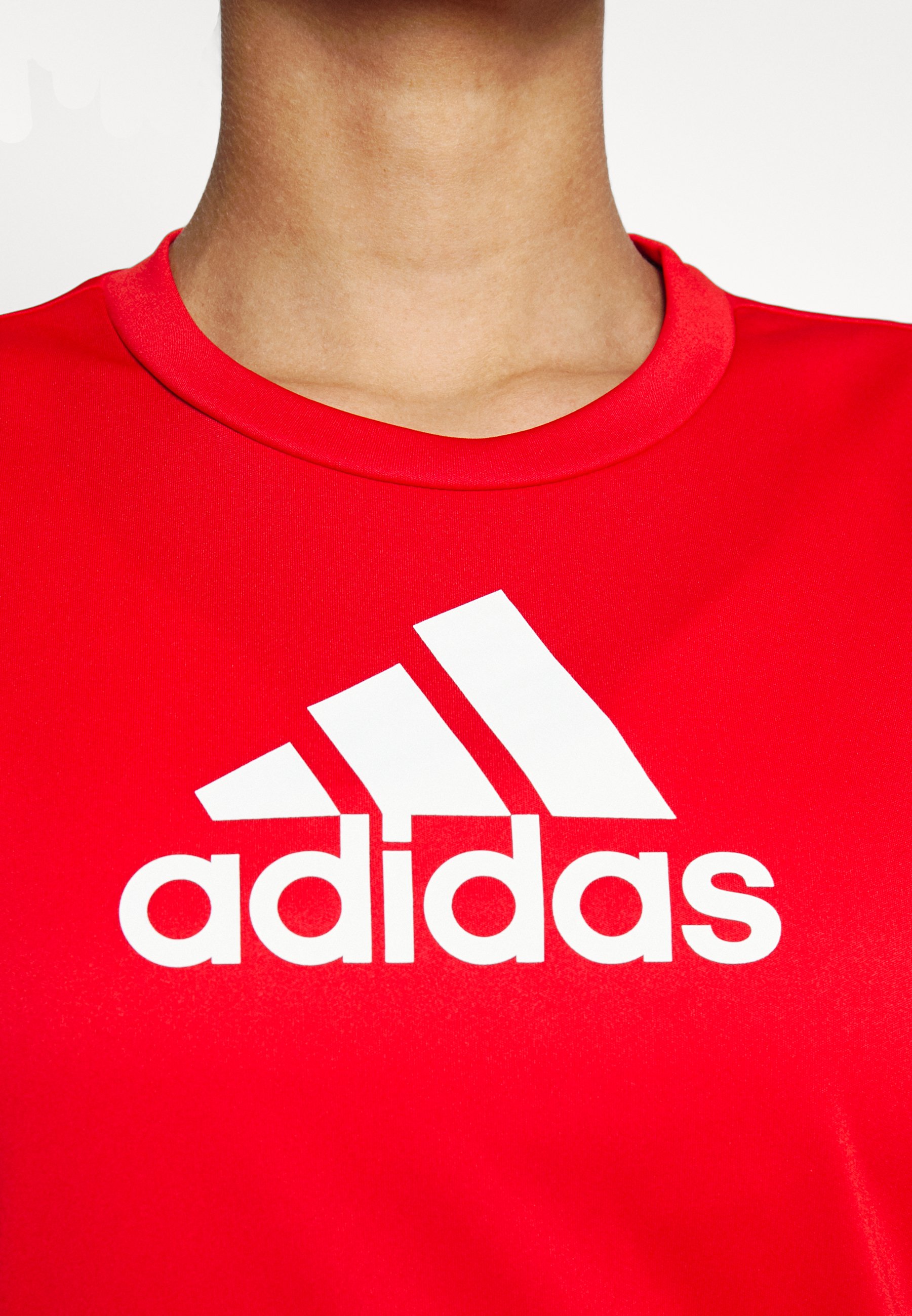 red and grey adidas shirt