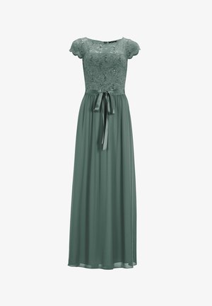 Robe longue verte avec un corsage en dentelle, des manches courtes à bordure festonnée, une ceinture à la taille et une jupe fluide pour une silhouette féminine.